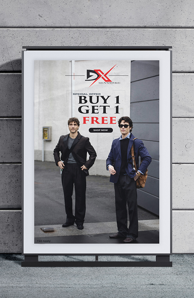 On a street billboard, a DX Men's Store promotional poster with the words "Official Opening – Buy 1 Get 1 Free" and two fashionablely dressed men. Digital Marketer