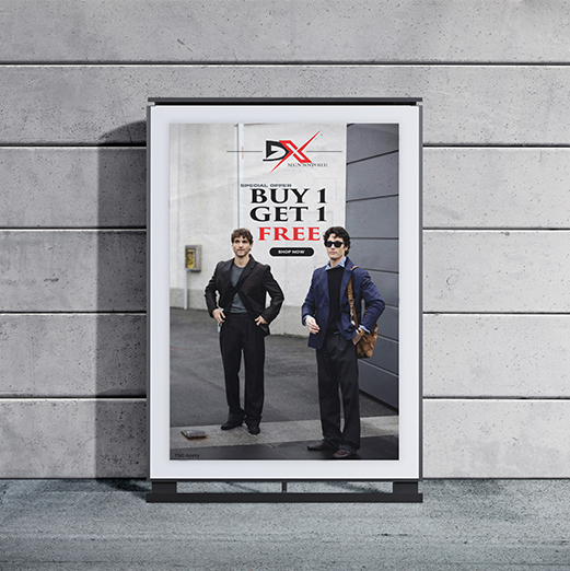On a street billboard, a DX Men's Store promotional poster with the words "Official Opening – Buy 1 Get 1 Free" and two fashionablely dressed men. Digital Marketer