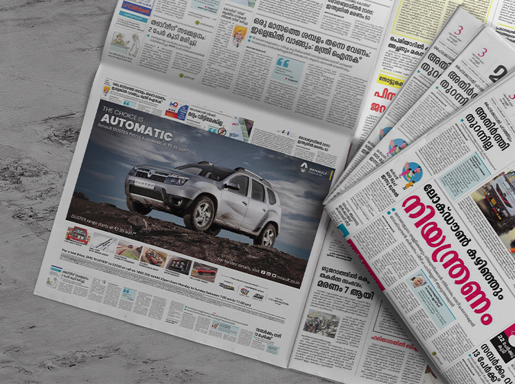 The Malayalam newspaper featured an advertisement for the Renault Duster automatic SUV, highlighting the car's features and deals. Digital Marketer