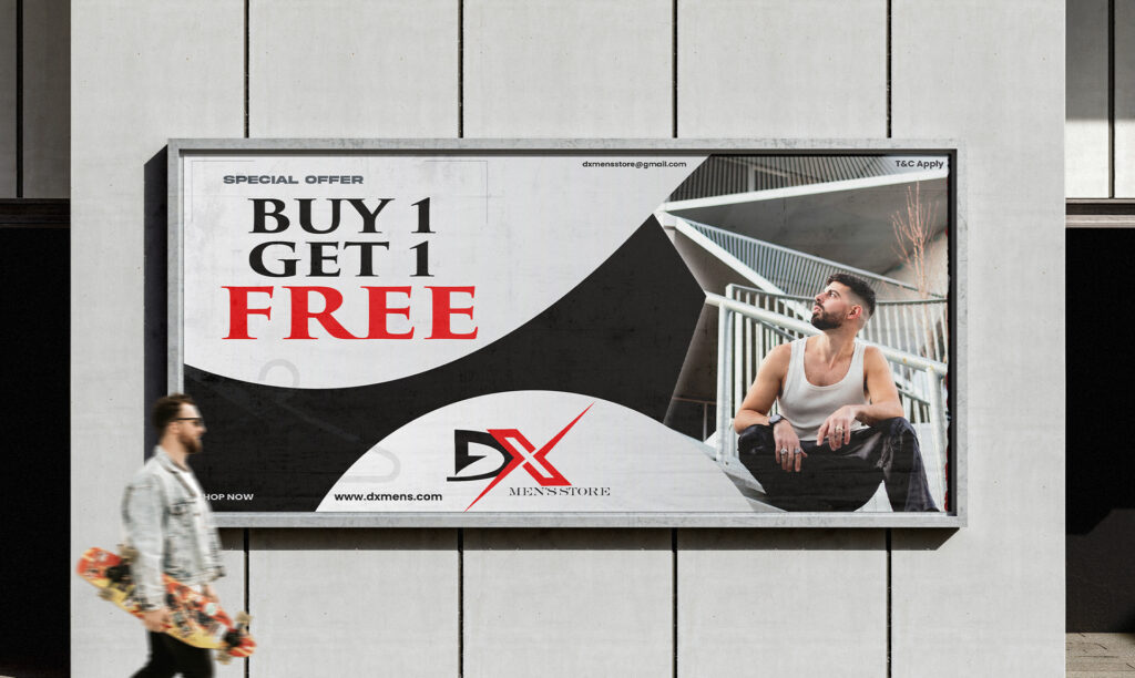 Large billboard for the DX Men's Store on a concrete wall with the DX logo at the bottom, a man in casual clothing sitting on steps, and the words "Buy 1 Get 1 Free" in black and red. Digital Marketer