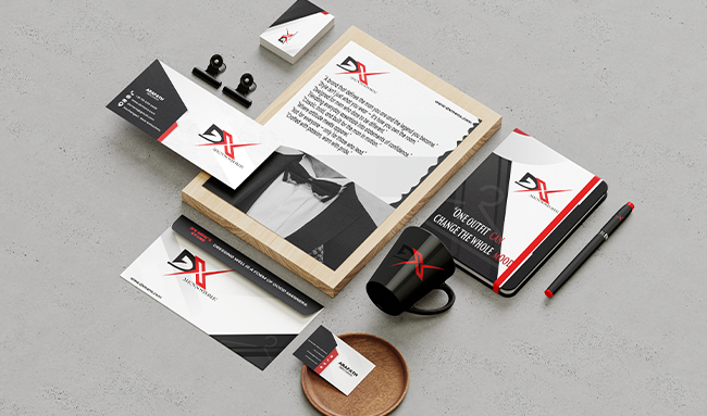 A mockup of DX Men's Store branding stationery featuring the DX logo on letterhead, business cards, envelopes, notebooks, mugs, and pens in black, white, and red on a gray background. Digital Marketer